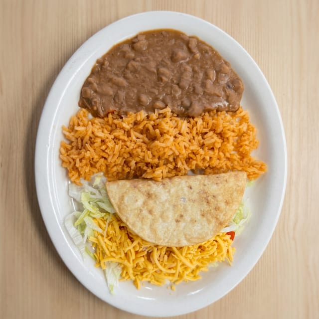 Kids Crispy or Soft Taco with Rice & Beans.
